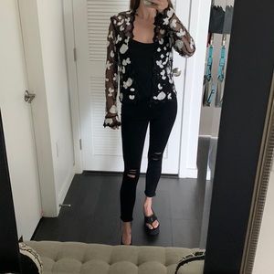 Paige, size 24, black, ripped, skinny jeans.